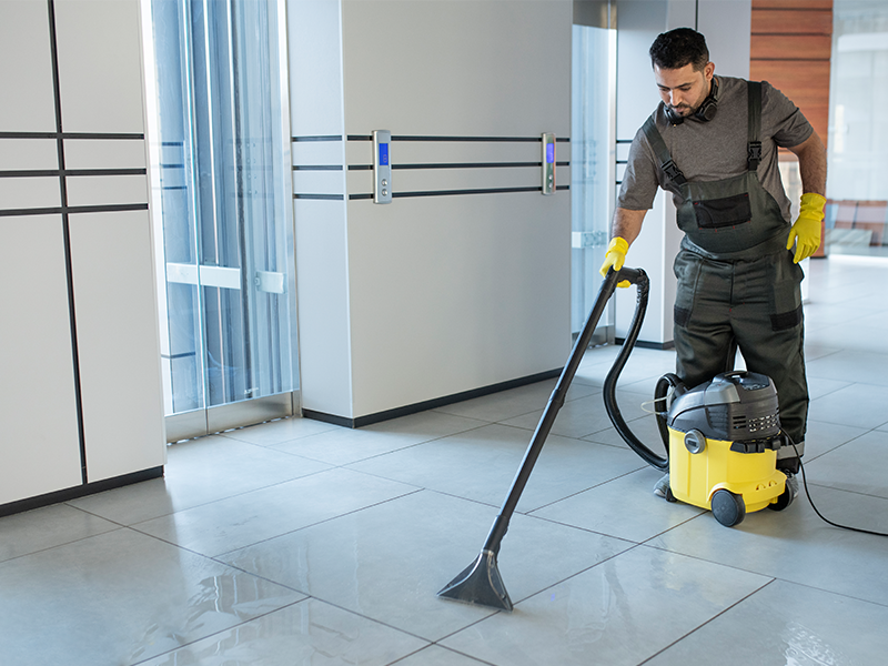 Commercial Cleaning Company Tech at Work